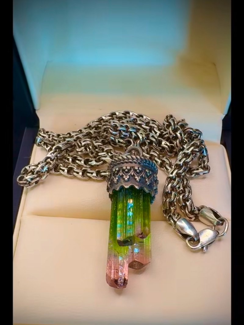 Crystal talisman in old-mine silver
